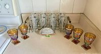 Overview of all glassware and tray on countertop