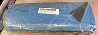 Front view of sealed stack of blue sandpaper sheets