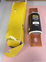 Fuse alongside damaged yellow Bussmann box