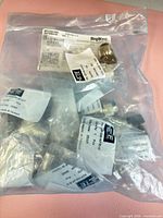 Sealed DigiKey bag containing multiple individually packaged adapters