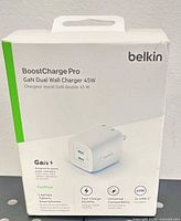 Front of sealed retail box showing model and specifications