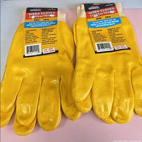 Front view both pairs Bennett yellow PVC gloves
