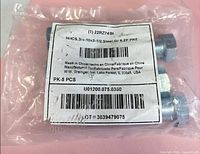 Factory bag showing label details and screws inside