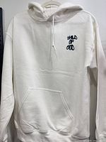 Front view of white hoodie showing chest logo, pocket and hood