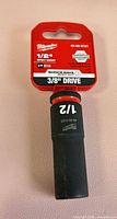 Front view of Milwaukee Shockwave 1/2" impact socket on card