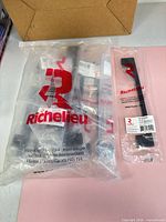 Group of Richelieu 8160 metal pulls sealed in manufacturer plastic bags