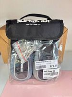 Front of sealed pouch showing Slingshot branding, straps and price label