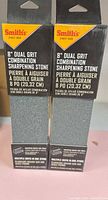 Front view of two boxed Smith's 8" dual-grit sharpening stones