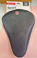 Front view of Schwinn gel bike seat cover in packaging