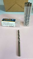 Pack of drill bits in tube and one bit displayed