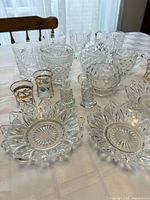 Full lot showing bowls, tumblers, shakers, cordials and creamer