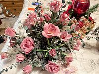 Pink rose arrangement overall view with Christmas centerpiece partially visible