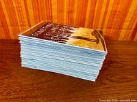 Side view of stacked bagged and boarded comics