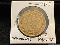 Obverse of 1925 Denmark 2 Kroner coin in holder