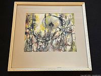 Frontal view of the framed abstract artwork showing composition, mat and frame