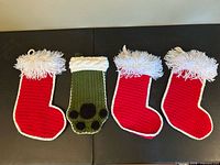 Group view of all four stockings laid out flat