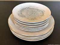 Stack of plates showing edges and glaze pattern