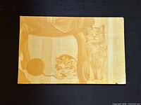 Full view of painting showing kittens, chair leg, ball of yarn