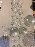 Group overview of all Candlewick pieces laid out on table