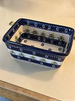 Polish pottery rectangular loaf dish with pine tree and snowflake pattern