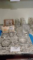 Group shot of entire glassware lot on countertop