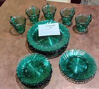 Full set laid out showing plate stacks and cups