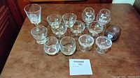 Group shot of all twelve glass pieces on table