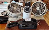 Lot showing two Lakewood fans, Aerclear air purifier and Oreck vacuum