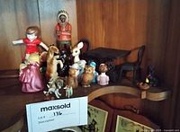 Group shot of all figurines on shelf