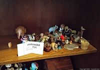 shelf view showing entire group of small figurines