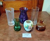 Group shot showing all six vases for size, form and colour comparison