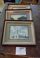 Overview of three stacked framed prints showing subjects, mats and frames