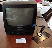 Front view of Sylvania CRT TV-VCR with antenna accessory