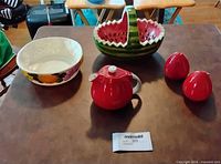 Group shot of all five ceramic pieces on table