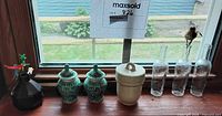 All items lined on windowsill showing size and grouping