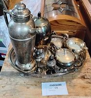 All seven silver-plated pieces arranged on tray showing overall condition and completeness