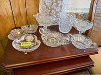 Group shot of all eight crystal pieces on table