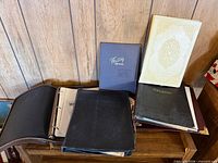 Group view of six portfolios on shelf