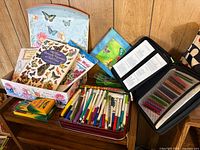 Overall lot with gel pen case, marker tin, coloring books, stencils, crayons and pencils