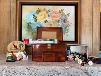 Overall lot with wooden sewing box open, cardboard box of thread spools, pincushion visible