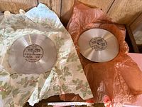 Two Speak-O-Phone discs with labels in tissue wrap