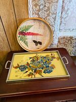 Both trays displayed together on wood surface