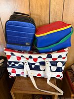 All three coolers stacked showing sizes and colors