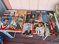 Group shot of all magazines laid on table