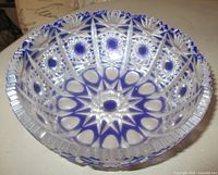 Interior view of cobalt blue cut to clear crystal bowl showing sawtooth rim and hobstar pattern