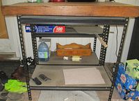 Front angled view showing shelves and frame structure