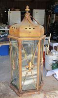 Full view of hexagonal metal and glass lantern with finish detail