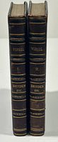 Spine view of the two leather-bound volumes with gilt lettering and raised bands