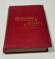 Front cover showing red cloth and gilt title