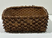 Overall view of rectangular handwoven wood basket